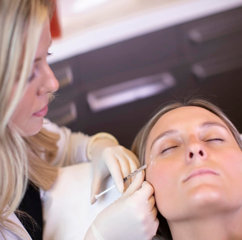 Injector performing Botox treatment at Cosmetic Skin & Laser Center in Wellington, Florida
