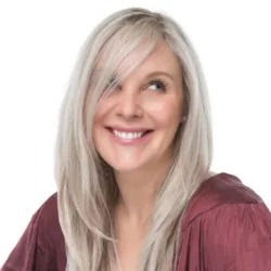 Woman with glowing skin enjoying a holiday evening in Downtown Naples near Fifth Avenue South