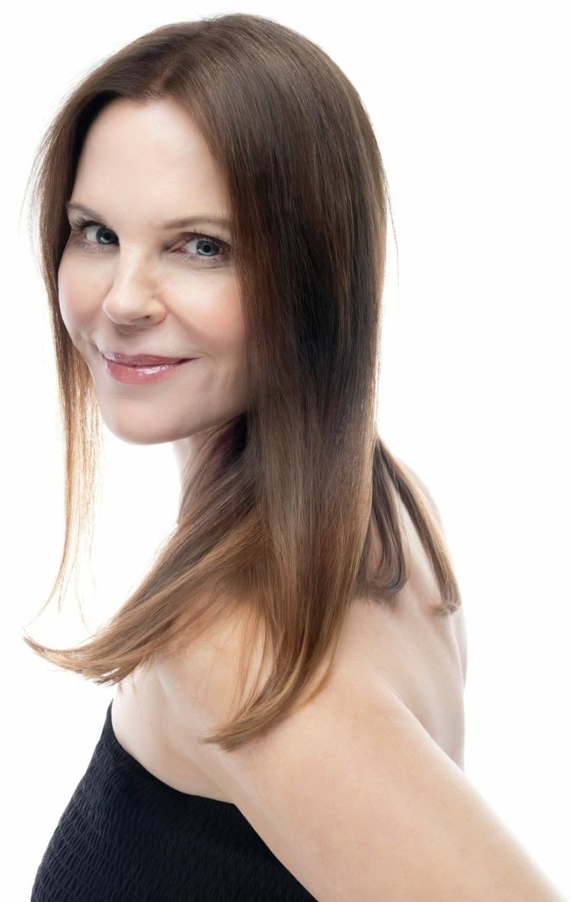 Woman with natural, refreshed skin smiling — CSLC aesthetic consultation, Michigan & Florida